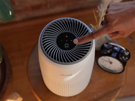 How to Reset Filter Light on Levoit Mini Air Purifier: A Journey Through Air and Light